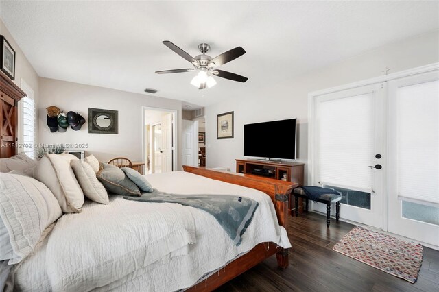6459 Ungerer St, Jupiter, FL 33458 - bedroom with dark wood finished floors and a ceiling fan