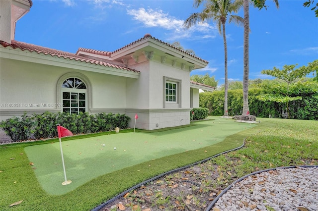 5963 NW 75th Way, Parkland, FL 33067 - view of yard featuring a putting green