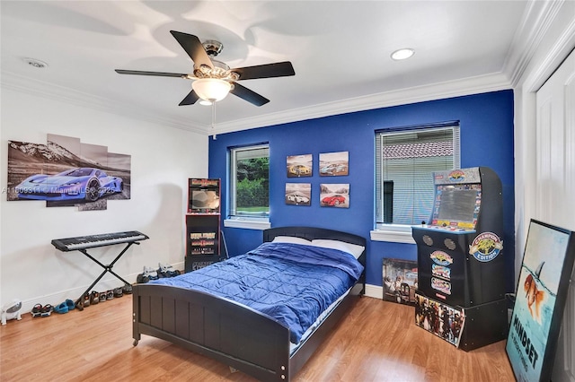 5963 NW 75th Way, Parkland, FL 33067 - bedroom featuring wood finished floors, baseboards, ornamental molding, and ceiling fan