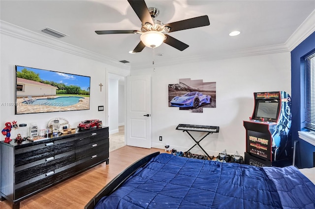 5963 NW 75th Way, Parkland, FL 33067 - bedroom with wood finished floors, ornamental molding, ceiling fan, and recessed lighting