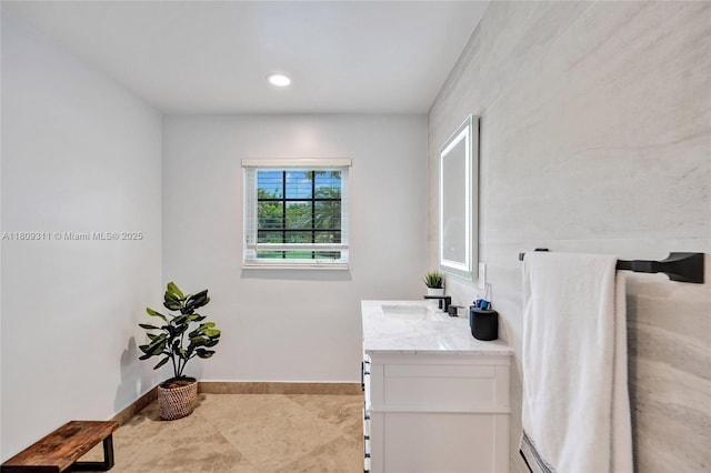 5963 NW 75th Way, Parkland, FL 33067 - bathroom featuring vanity, baseboards, and tile patterned floors