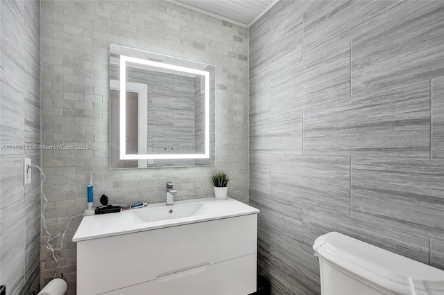 5963 NW 75th Way, Parkland, FL 33067 - half bathroom featuring tile walls, toilet, and vanity