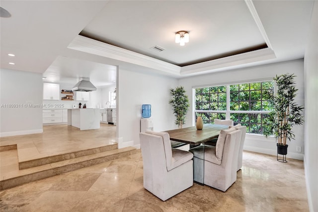 5963 NW 75th Way, Parkland, FL 33067 - dining space featuring a tray ceiling, baseboards, recessed lighting, and ornamental molding