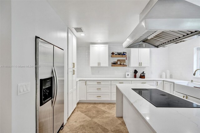 5963 NW 75th Way, Parkland, FL 33067 - kitchen featuring stainless steel fridge, wall chimney exhaust hood, black electric stovetop, open shelves, and a sink