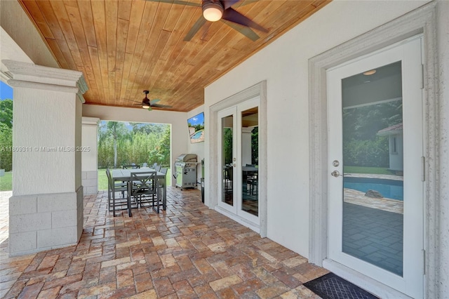 5963 NW 75th Way, Parkland, FL 33067 - view of patio with ceiling fan, area for grilling, outdoor dining space, and french doors