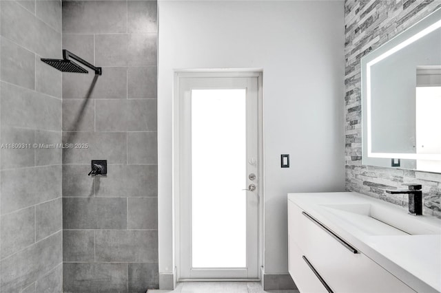 5963 NW 75th Way, Parkland, FL 33067 - full bathroom with a tile shower, vanity, and healthy amount of natural light