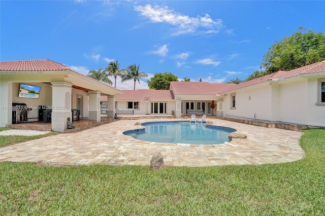 5963 NW 75th Way, Parkland, FL 33067 - swimming pool featuring a patio and area for grilling