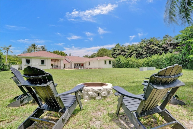 5963 NW 75th Way, Parkland, FL 33067 - view of green lawn featuring a fire pit