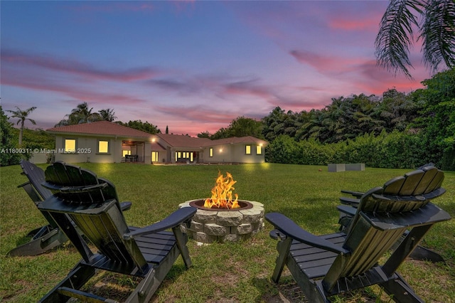 5963 NW 75th Way, Parkland, FL 33067 - view of grassy yard featuring an outdoor fire pit