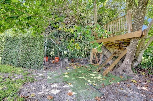 5963 NW 75th Way, Parkland, FL 33067 - view of yard with a deck and stairway