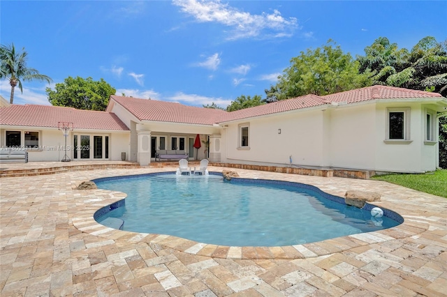 5963 NW 75th Way, Parkland, FL 33067 - outdoor pool with a patio area and french doors