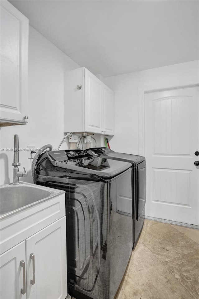 5963 NW 75th Way, Parkland, FL 33067 - washroom featuring cabinet space and separate washer and dryer