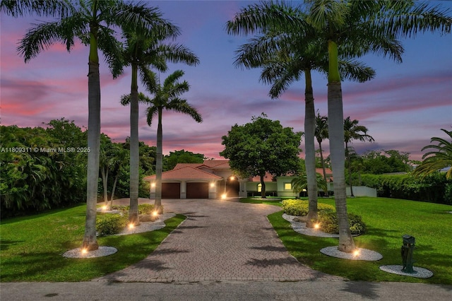 5963 NW 75th Way, Parkland, FL 33067 - view of front of home featuring a front yard, decorative driveway, and an attached garage