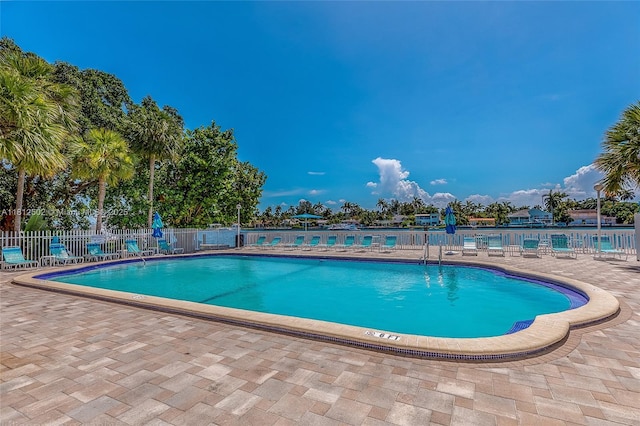 1455 N Treasure Dr Unit 6C, North Bay Village, FL 33141 - community pool featuring a patio area