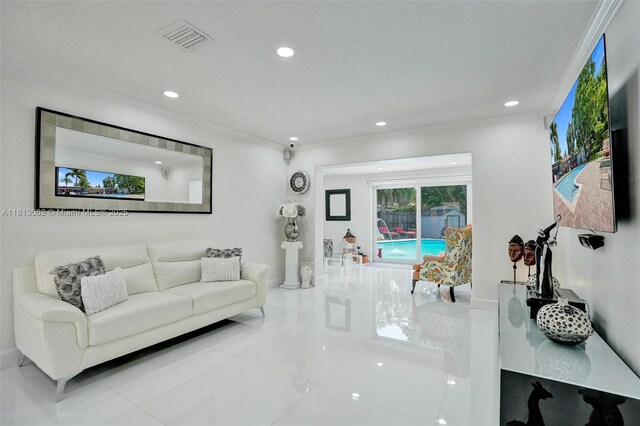 8438 NW 26th Dr, Coral Springs, FL 33065 - tiled living area with crown molding and recessed lighting