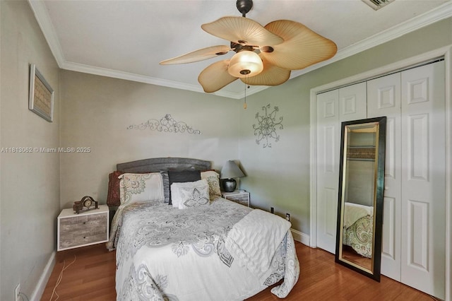 8438 NW 26th Dr, Coral Springs, FL 33065 - bedroom with wood finished floors, ornamental molding, a closet, and ceiling fan