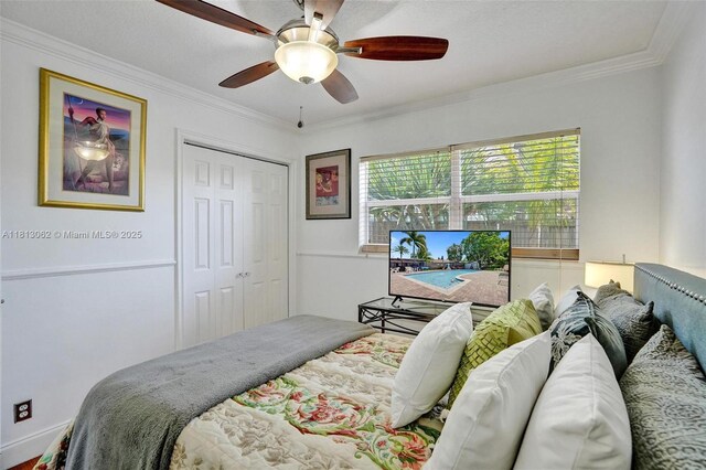 8438 NW 26th Dr, Coral Springs, FL 33065 - bedroom featuring a closet, ornamental molding, and a ceiling fan
