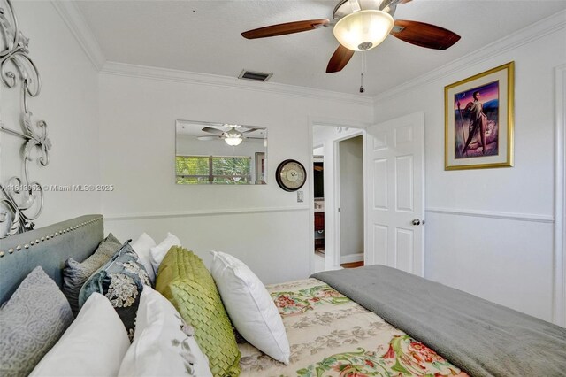 8438 NW 26th Dr, Coral Springs, FL 33065 - bedroom featuring crown molding and a ceiling fan