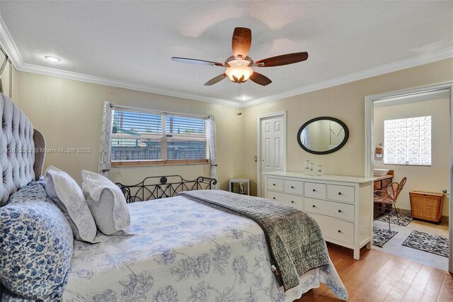 8438 NW 26th Dr, Coral Springs, FL 33065 - bedroom featuring wood finished floors, crown molding, and ceiling fan