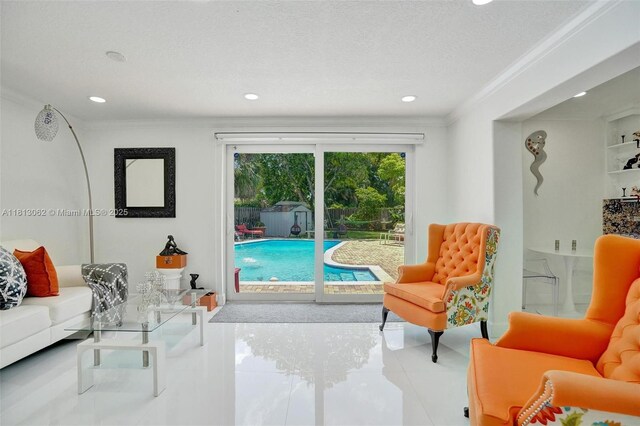 8438 NW 26th Dr, Coral Springs, FL 33065 - living room with crown molding, recessed lighting, and tile patterned floors