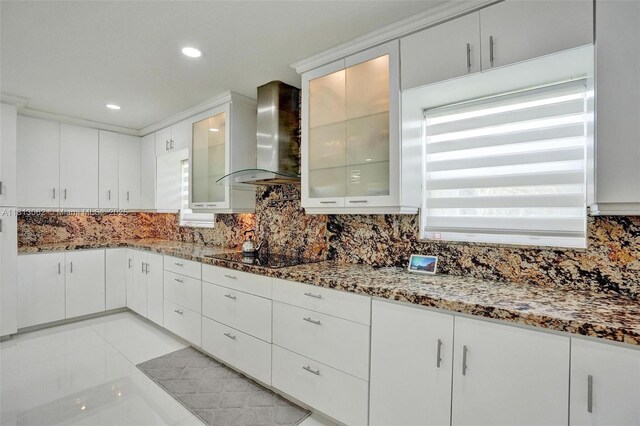 8438 NW 26th Dr, Coral Springs, FL 33065 - kitchen featuring wall chimney range hood, black electric cooktop, tasteful backsplash, light stone countertops, and recessed lighting