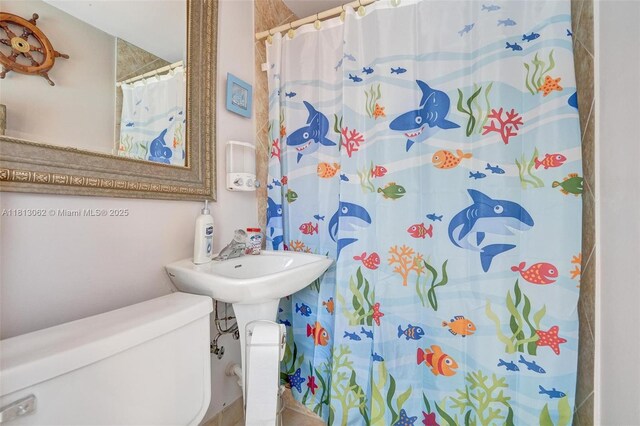 8438 NW 26th Dr, Coral Springs, FL 33065 - full bath with toilet and curtained shower