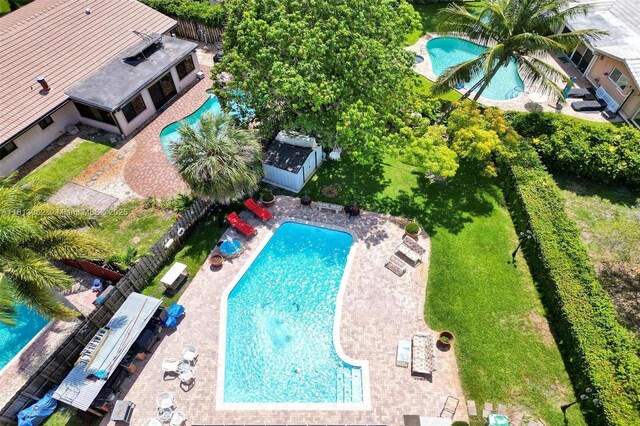 8438 NW 26th Dr, Coral Springs, FL 33065 - view of subject property featuring a pool area