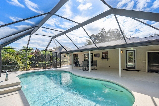 11613 N 42nd Rd N, West Palm Beach, FL 33411 - swimming pool featuring a patio and glass enclosure