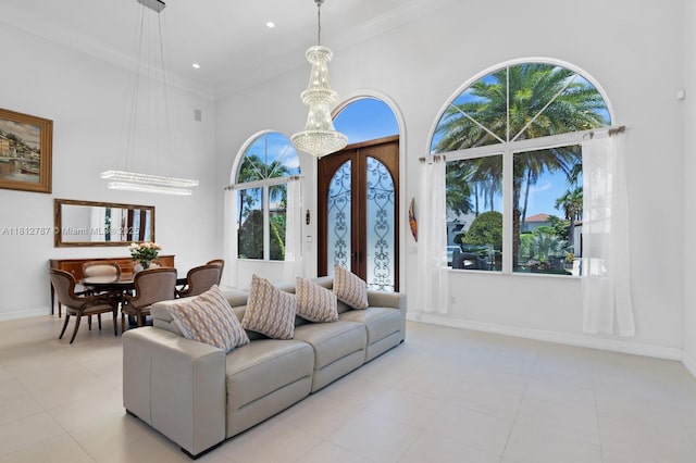 4241 NE 23rd Ter, Lighthouse Point, FL 33064 - tiled living room with a high ceiling, crown molding, and recessed lighting