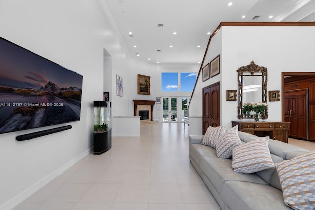 4241 NE 23rd Ter, Lighthouse Point, FL 33064 - living area featuring a high ceiling, recessed lighting, crown molding, a high end fireplace, and light tile patterned floors