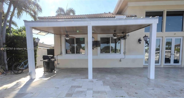 4241 NE 23rd Ter, Lighthouse Point, FL 33064 - view of patio with a ceiling fan and area for grilling
