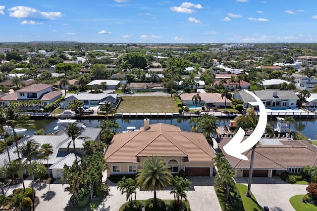 4241 NE 23rd Ter, Lighthouse Point, FL 33064 - aerial perspective of suburban area featuring a large body of water