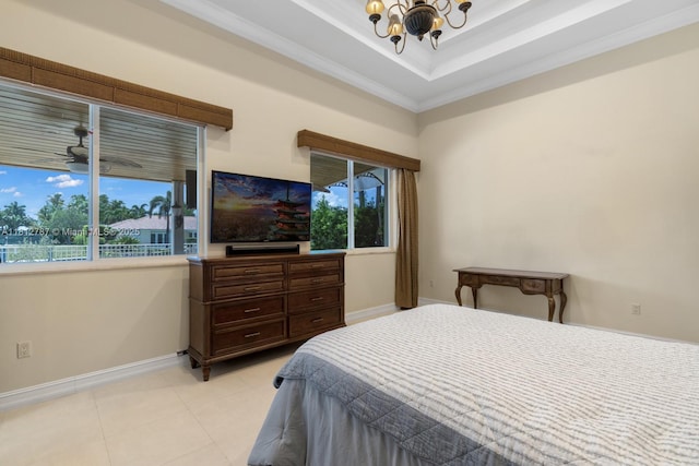 4241 NE 23rd Ter, Lighthouse Point, FL 33064 - bedroom featuring a chandelier, multiple windows, crown molding, light tile patterned floors, and a tray ceiling