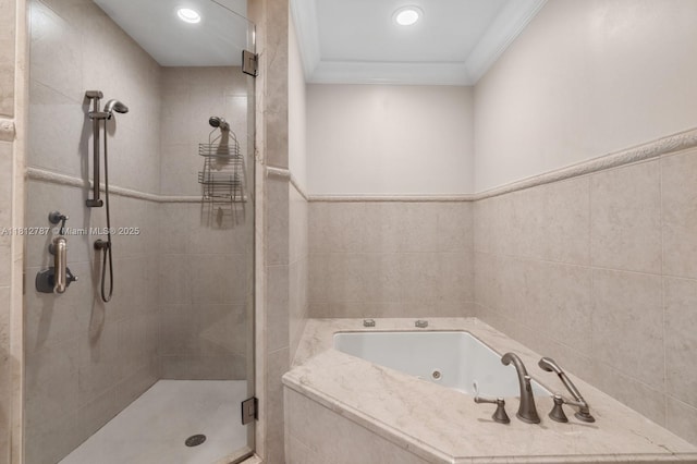 4241 NE 23rd Ter, Lighthouse Point, FL 33064 - bathroom featuring a shower stall, a jetted tub, crown molding, recessed lighting, and tile walls