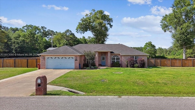 3661 Misty, Woods, FL 32571 - ranch-style home featuring concrete driveway, an attached garage, and brick siding