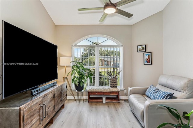 3661 Misty, Woods, FL 32571 - sitting room featuring light wood-style floors, ceiling fan, and baseboards