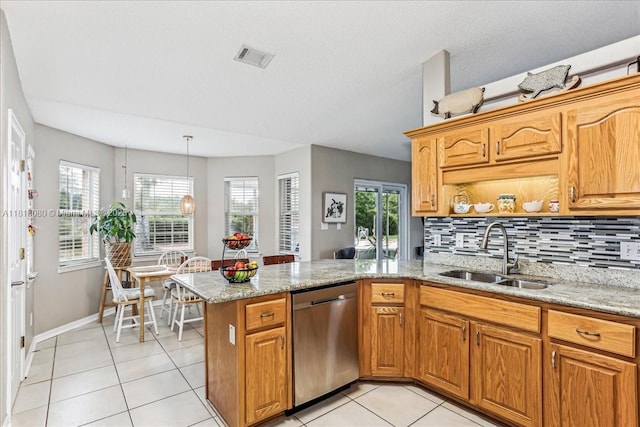 3661 Misty, Woods, FL 32571 - kitchen featuring dishwasher, a sink, a peninsula, and healthy amount of natural light