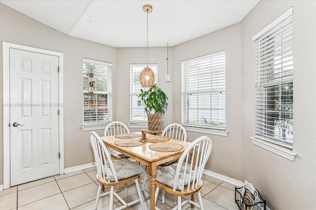 3661 Misty, Woods, FL 32571 - dining area with light tile patterned flooring and baseboards