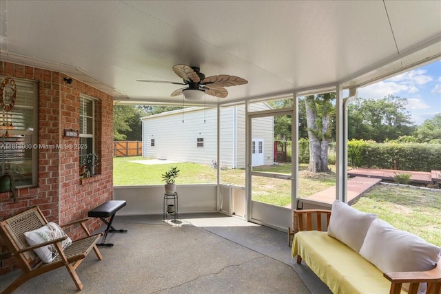 3661 Misty, Woods, FL 32571 - sunroom / solarium with ceiling fan and an outdoor living space