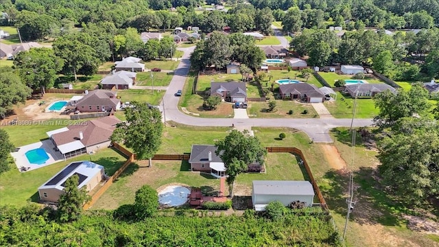 3661 Misty, Woods, FL 32571 - aerial overview of property's location featuring a pool area and nearby suburban area