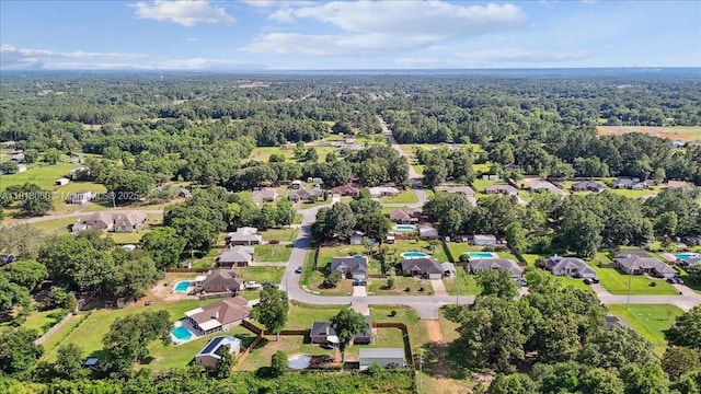 3661 Misty, Woods, FL 32571 - aerial view of residential area with a forest