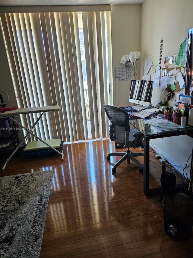 2418 NE 10th St Unit 127, Hallandale Beach, FL 33009 - home office with wood finished floors and floor to ceiling windows
