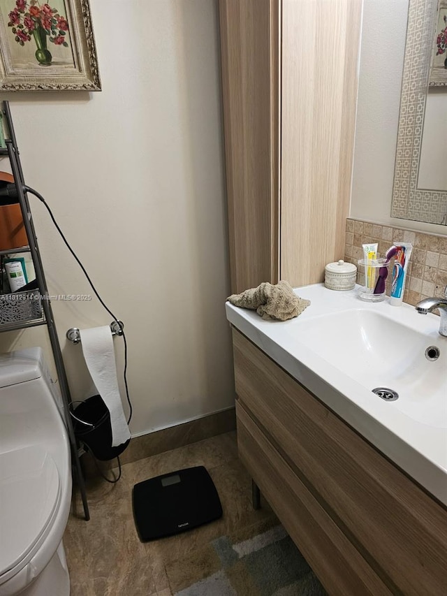 2418 NE 10th St Unit 127, Hallandale Beach, FL 33009 - bathroom featuring vanity and toilet