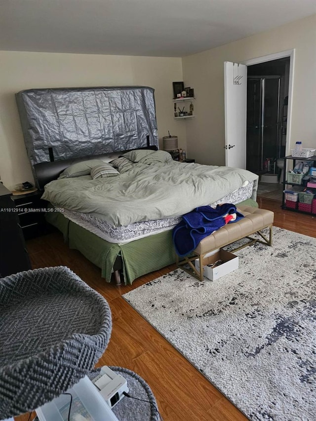 2418 NE 10th St Unit 127, Hallandale Beach, FL 33009 - bedroom with wood finished floors