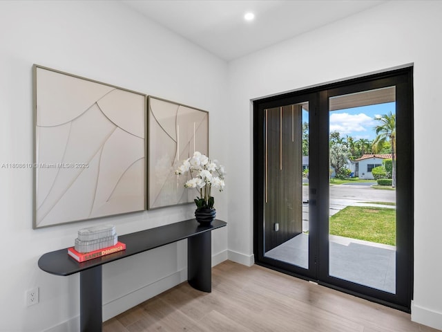 1735 SW 24th Ter, Miami, FL 33145 - foyer entrance featuring wood finished floors, baseboards, and recessed lighting