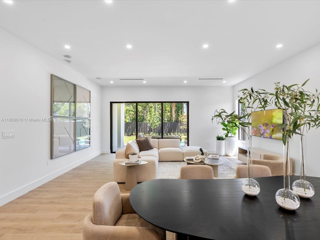 1735 SW 24th Ter, Miami, FL 33145 - living room featuring recessed lighting, light wood-style floors, plenty of natural light, and baseboards