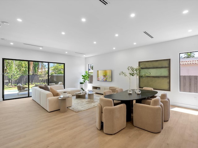 1735 SW 24th Ter, Miami, FL 33145 - living area featuring light wood-style flooring and recessed lighting