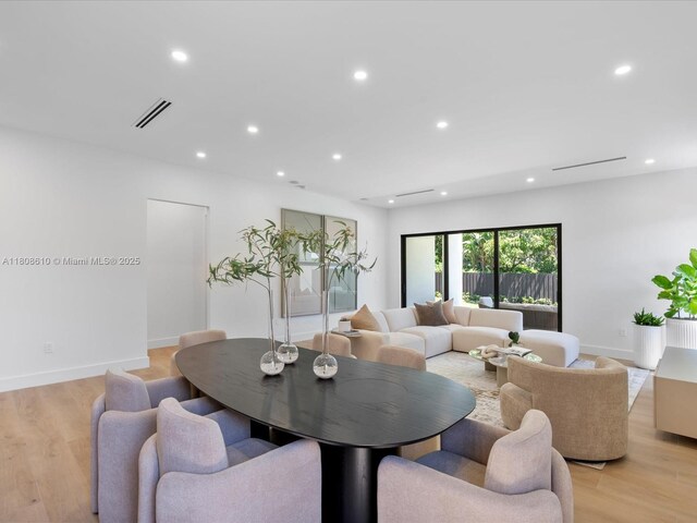 1735 SW 24th Ter, Miami, FL 33145 - dining space with recessed lighting, light wood finished floors, and baseboards