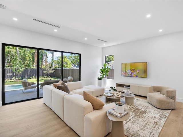 1735 SW 24th Ter, Miami, FL 33145 - living area with recessed lighting and light wood-style floors