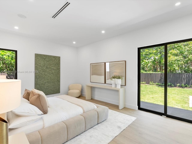 1735 SW 24th Ter, Miami, FL 33145 - bedroom with access to outside, light wood-style flooring, recessed lighting, and baseboards